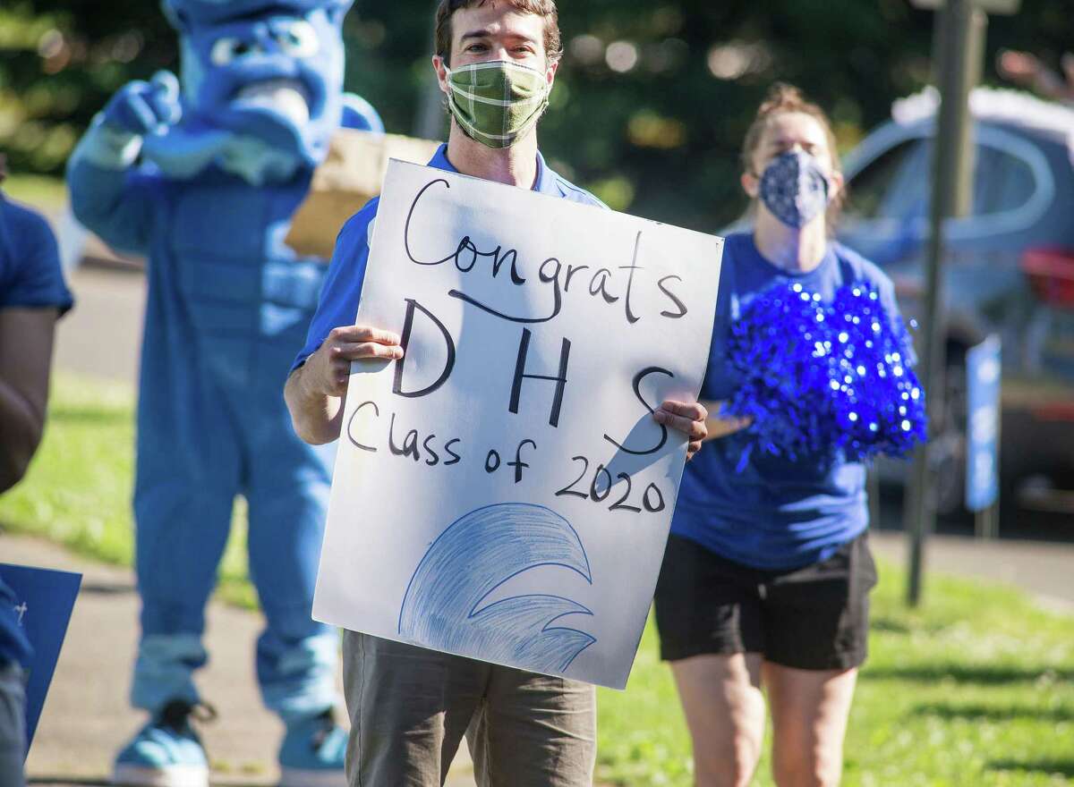 Marc Power. Darien High held a wave-through graduation car parade for the Class of 2020 seniors on the morning of June 12, after postponing it due to weather from June 11.