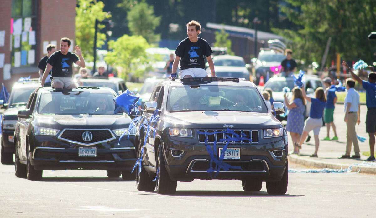 Darien High held a wave-through graduation car parade for the Class of 2020 seniors on the morning of June 12, after postponing it due to weather from June 11.