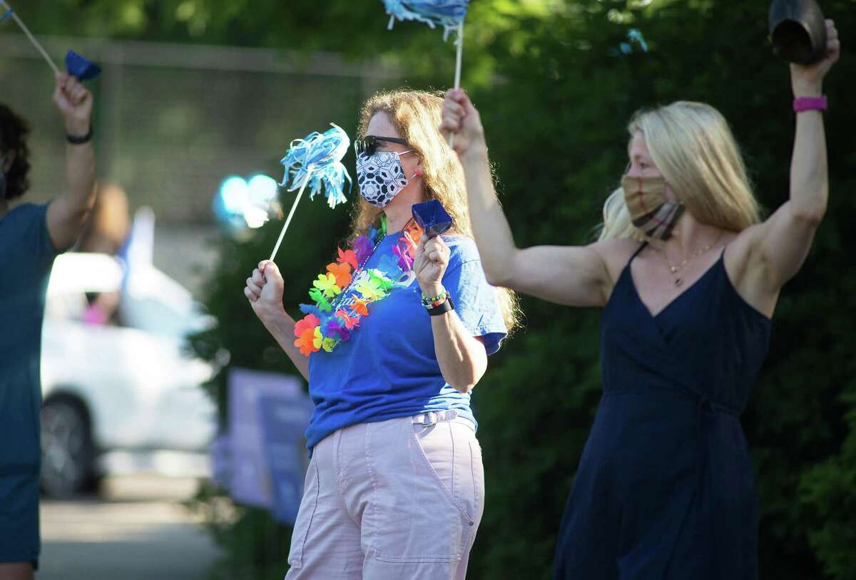 Darien High held a wave-through graduation car parade for the Class of 2020 seniors on the morning of June 12, after postponing it due to weather from June 11.