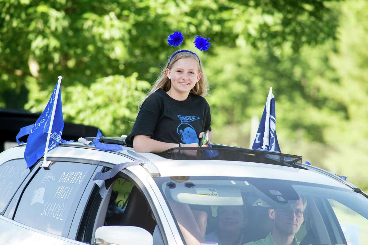 Katie Lane. Darien High held a wave-through graduation car parade for the Class of 2020 seniors on the morning of June 12, after postponing it due to weather from June 11.