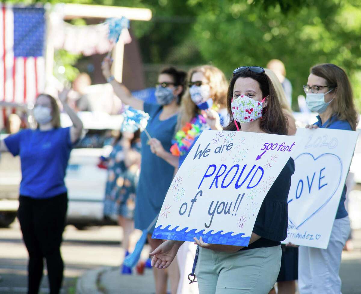 Darien High held a wave-through graduation car parade for the Class of 2020 seniors on the morning of June 12, after postponing it due to weather from June 11.