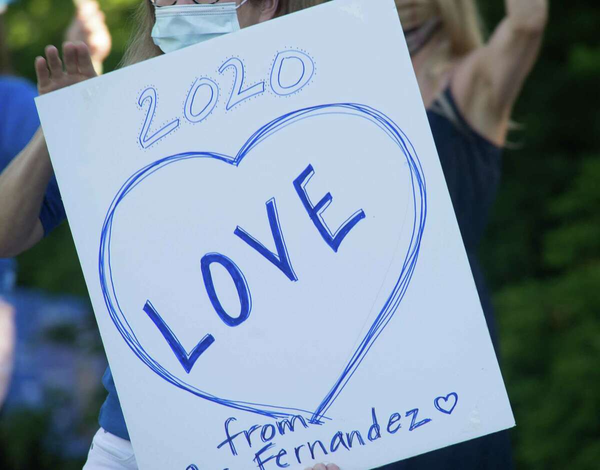 Darien High held a wave-through graduation car parade for the Class of 2020 seniors on the morning of June 12, after postponing it due to weather from June 11.