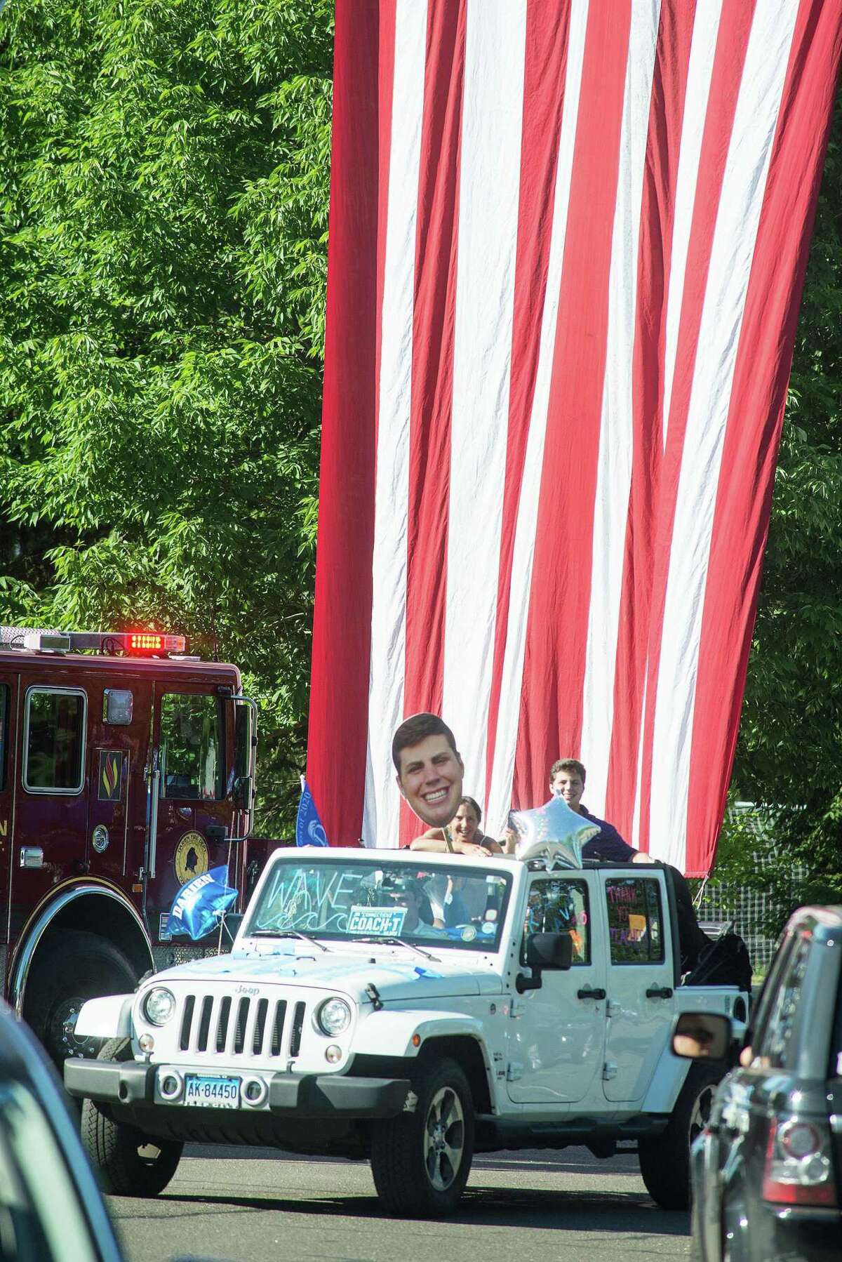 Darien High held a wave-through graduation car parade for the Class of 2020 seniors on the morning of June 12, after postponing it due to weather from June 11.