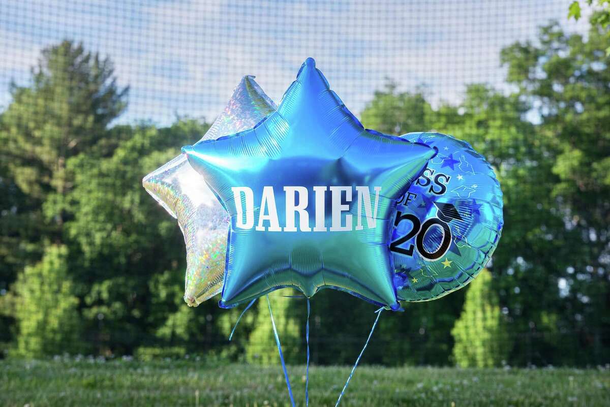 Darien High held a wave-through graduation car parade for the Class of 2020 seniors on the morning of June 12, after postponing it due to weather from June 11.