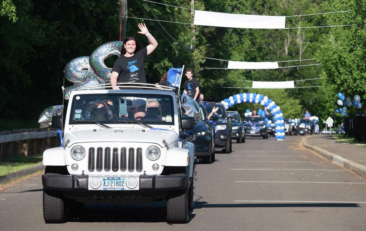 Catie Duggan. Darien High held a wave-through graduation car parade for the Class of 2020 seniors on the morning of June 12, after postponing it due to weather from June 11.