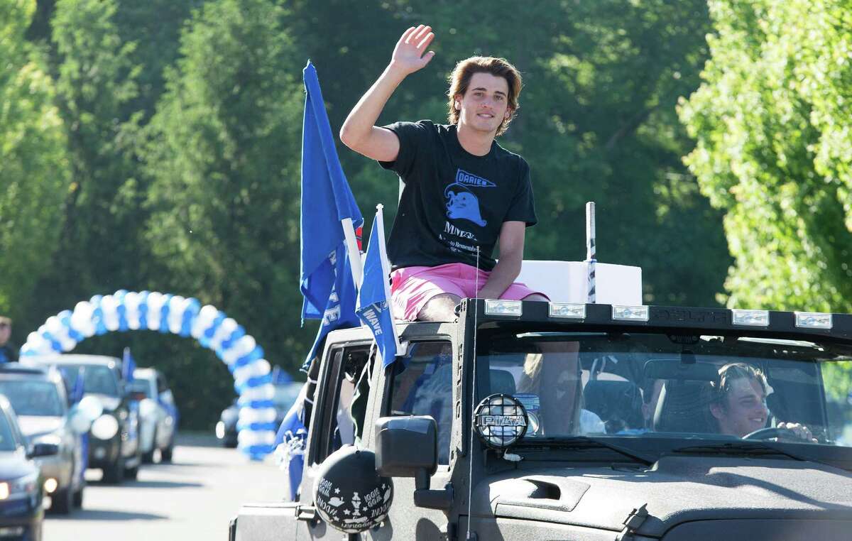 Cole Branca. Darien High held a wave-through graduation car parade for the Class of 2020 seniors on the morning of June 12, after postponing it due to weather from June 11.