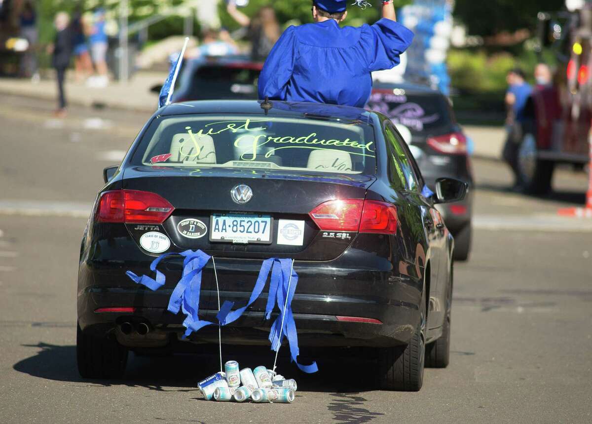 Darien High held a wave-through graduation car parade for the Class of 2020 seniors on the morning of June 12, after postponing it due to weather from June 11.