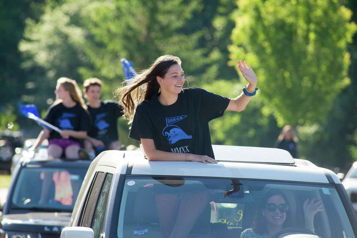 Annie Glassmeyer. Darien High held a wave-through graduation car parade for the Class of 2020 seniors on the morning of June 12, after postponing it due to weather from June 11.