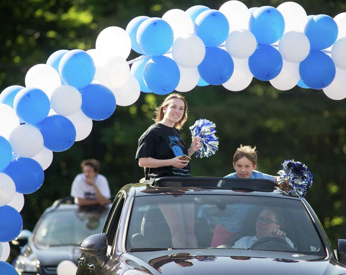Darien High held a wave-through graduation car parade for the Class of 2020 seniors on the morning of June 12, after postponing it due to weather from June 11.