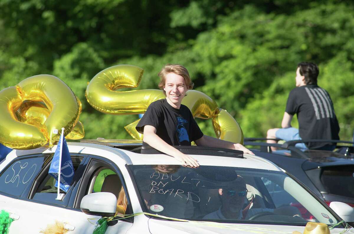 Darien High held a wave-through graduation car parade for the Class of 2020 seniors on the morning of June 12, after postponing it due to weather from June 11.