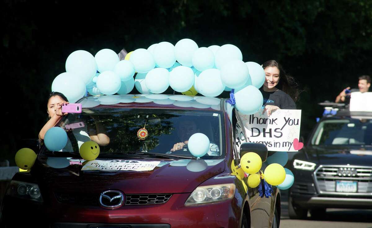 Darien High held a wave-through graduation car parade for the Class of 2020 seniors on the morning of June 12, after postponing it due to weather from June 11.