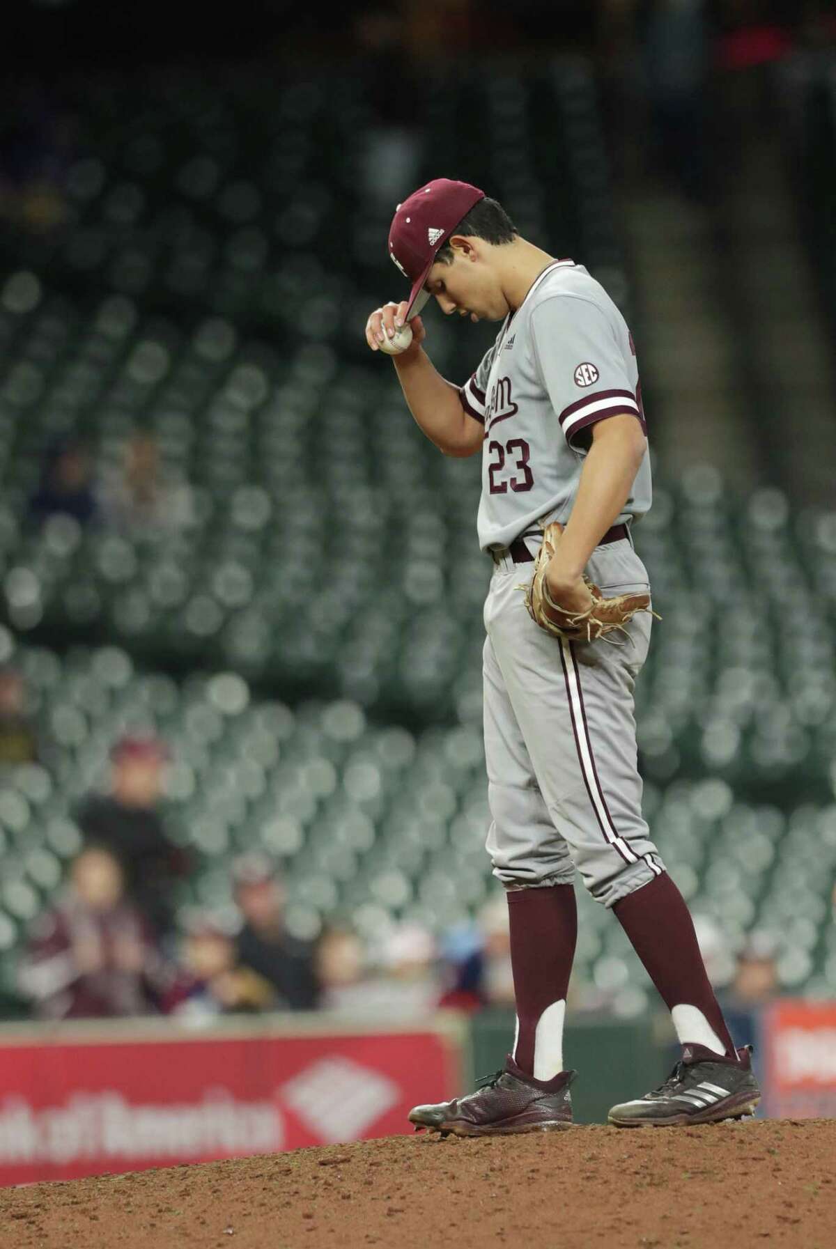 Texas Aggie Christian Roa (23) warms up during the ninth inning of a game in the 2019 Shriners College Classic at Minute Maid Park, Sunday, March 3, 2019, in Houston.