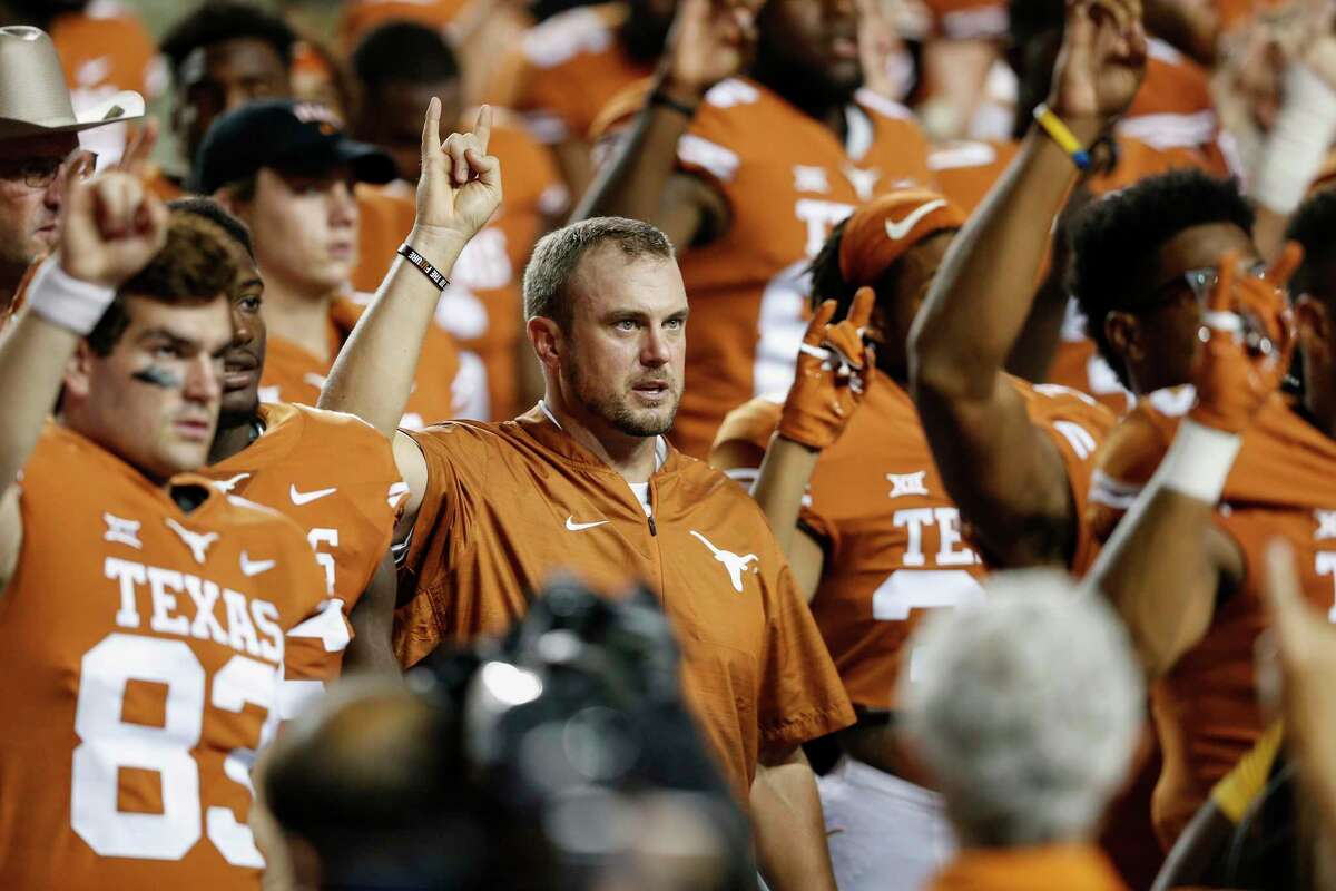 AUSTIN, TX - SEPTEMBER 08: Head coach Tom Herman of the Texas Longhorns sings The Eyes of Texas after the game against the Tulsa Golden Hurricane at Darrell K Royal-Texas Memorial Stadium on September 8, 2018 in Austin, Texas. (Photo by Tim Warner/Getty Images)