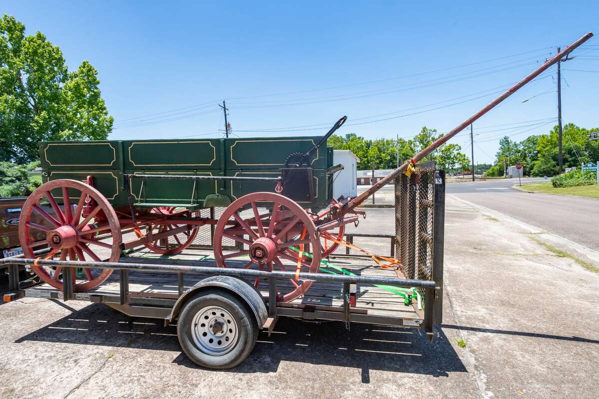 The Silsbee Ice House Museum received a 1903 ice wagon for its collection on Saturday, but it was just a bit too wide to get through the double doors of the museum. Photo made on June 13, 2020. Fran Ruchalski/The Enterprise
