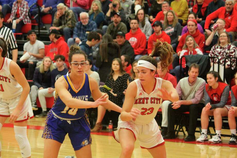 Breanna Berry (left) was a three-sport Morley Stanwood athlete in basketball, volleyball and track. (Pioneer file photo)