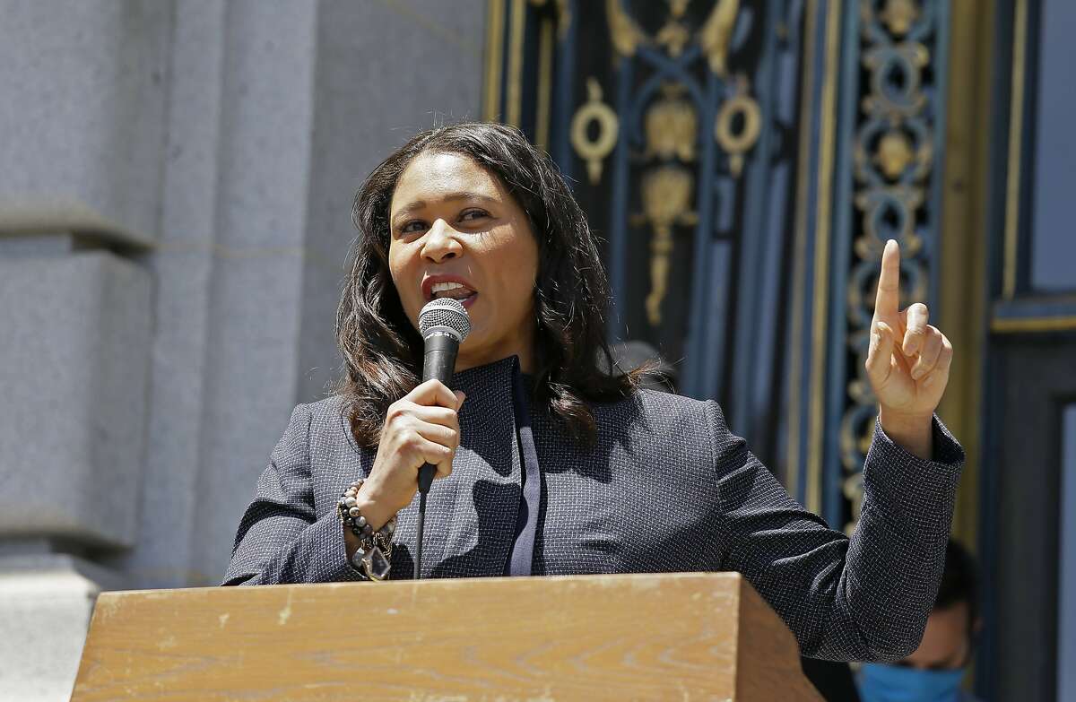 In this photo taken June 1, 2020, San Francisco Mayor London Breed speaks to a group protesting police racism outside City Hall in San Francisco. San Francisco police will stop responding to neighbor disputes, reports on homeless people, school discipline interventions and other non-criminal activities as part of a police reform plan announced Thursday, June 11, 2020. Mayor London Breed's said officers would be replaced on non-violent calls by trained and non-armed professionals to limit unnecessary confrontation between the police department and the community. (AP Photo/Eric Risberg)