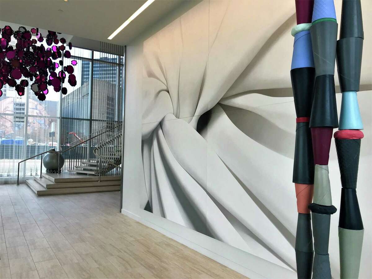 Alison Watt’s “Volvere” dominates a wall of the lobby of Dallas’ new Hall Arts Hotel.