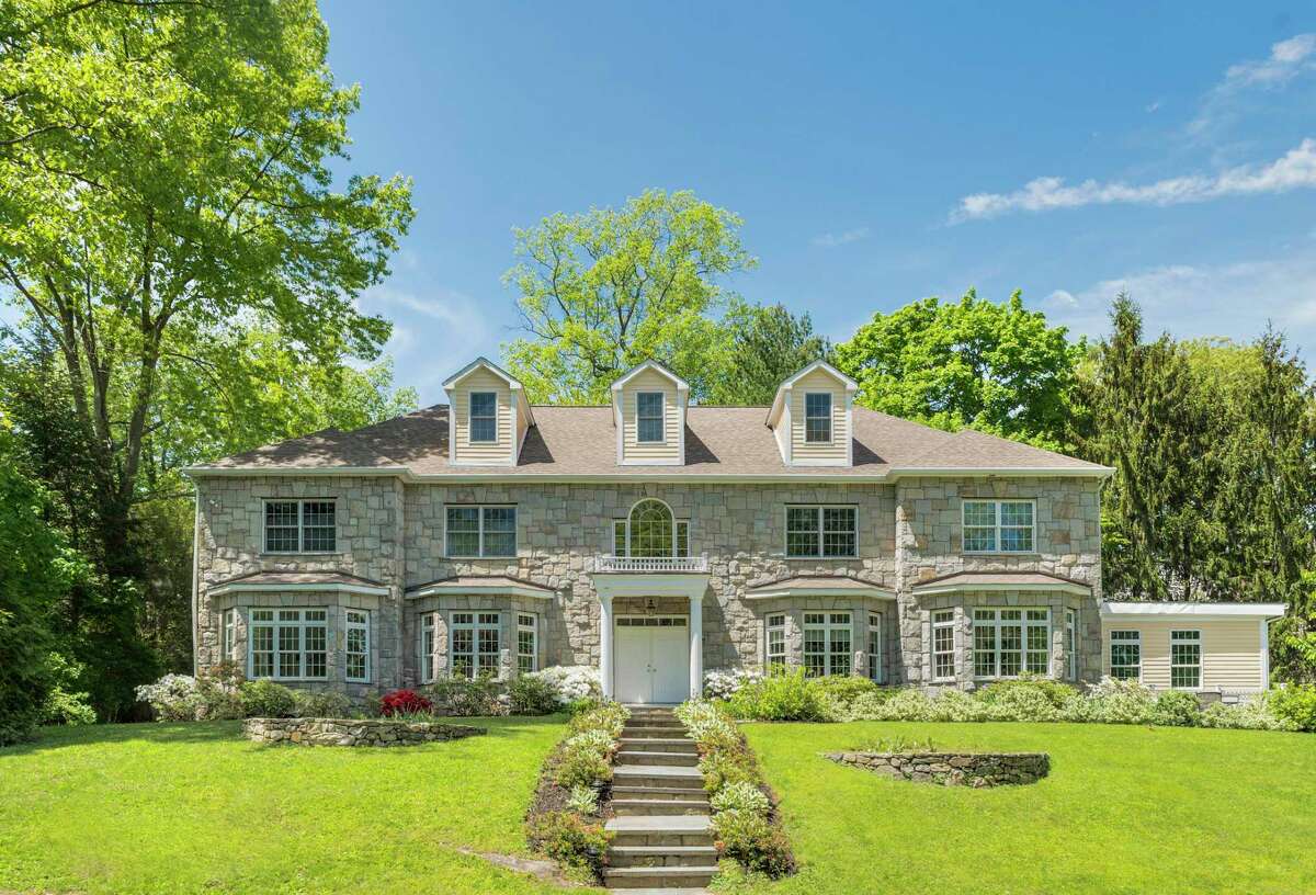 14 Coventry Lane debuted in 2006 on a 0.44-acre lot on a Riverside cul-de-sac. The six-bedroom stone colonial was more recently updated in 2018. Berkshire Hathaway HomeServices, New England Properties, is the listing brokerage for the $3.29 million property.