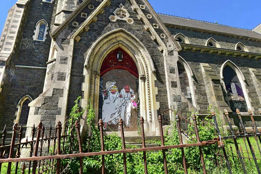 A wedding mural is seen painted on a door at St. Joseph's Church on the corner of Second and Ten Broeck Streets on Tuesday, June 16, 2020 in Albany, N.Y. (Lori Van Buren/Times Union)