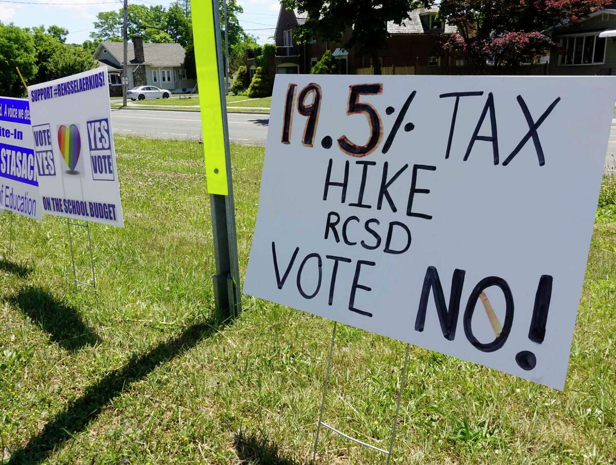 A view of signs dealing with the school budget vote on Washington Ave. on Tuesday, June 16, 2020, in Rensselaer, N.Y. (Paul Buckowski/Times Union)