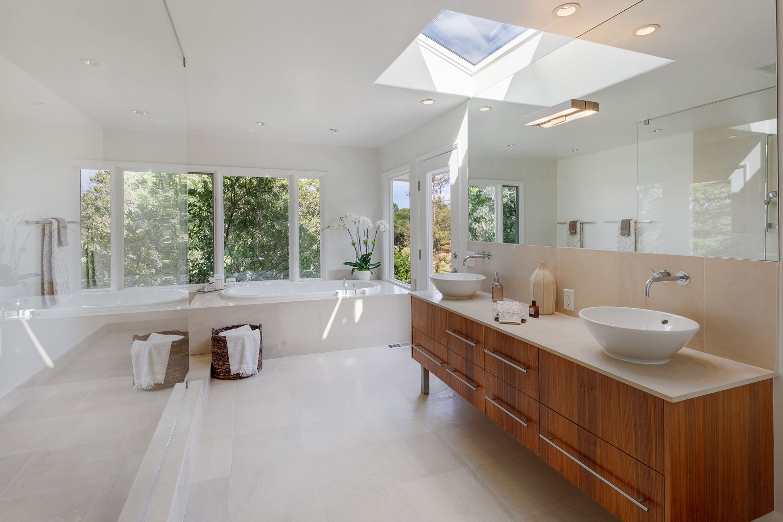 The master bath offers a soaking tub plus capacious shower.