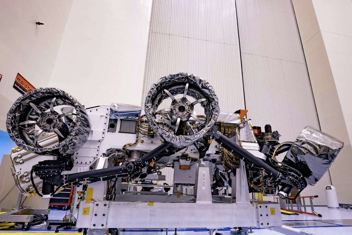 Wheels are installed on NASA’s Mars Perseverance rover inside Kennedy Space Center’s Payload Hazardous Servicing Facility on March 30, 2020. Perseverance is expected to launch aboard a United Launch Alliance Atlas V 541 rocket from Cape Canaveral Air Force Station in July 2020. The rover is expected to land on Mars on Feb. 18, 2021.