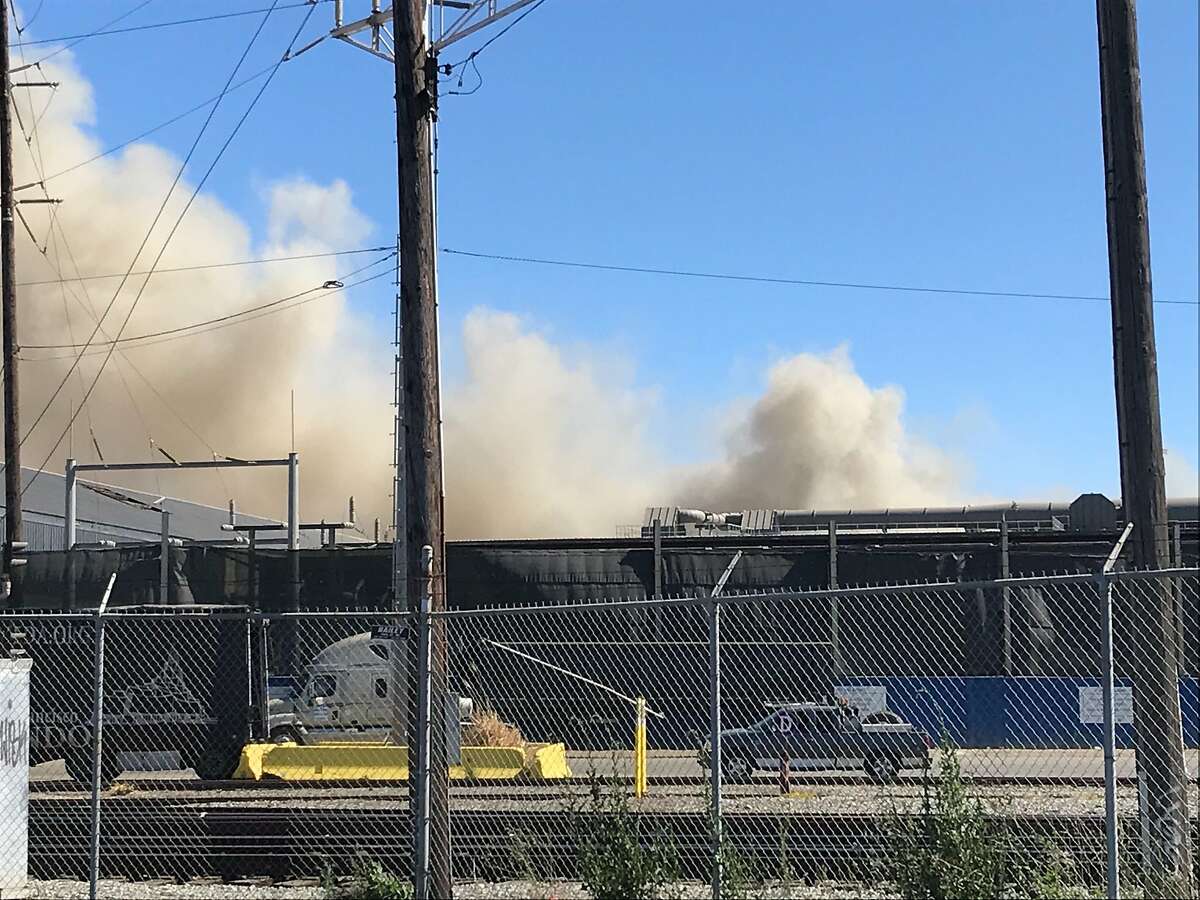 Firefighters were battling a blaze at the Schnitzer Steel recycling facility in Oakland on Wednesday, June 17, 2020.