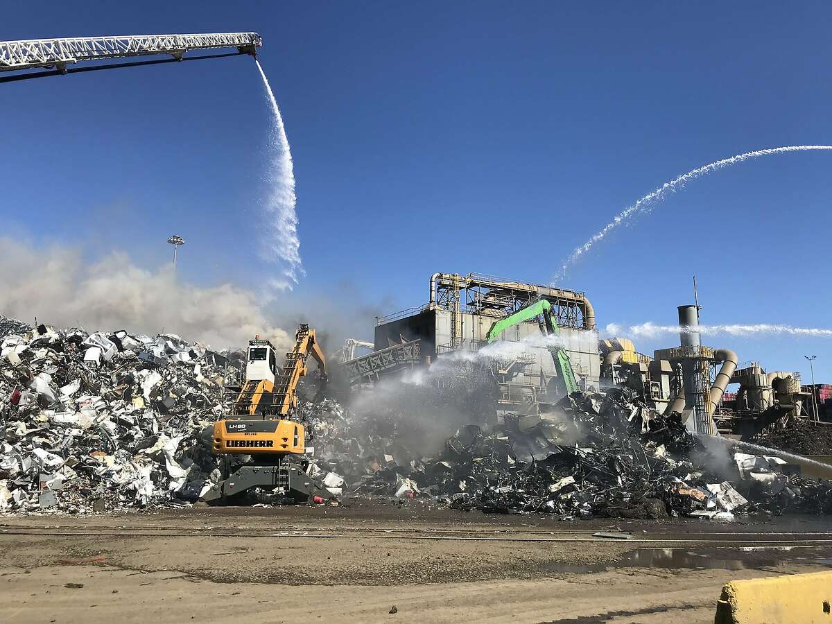 Oakland firefighters contained a blaze that burned metal debris at�the�Schnitzer�Steel recycling facility in Oakland on Wednesday, June 17, 2020.