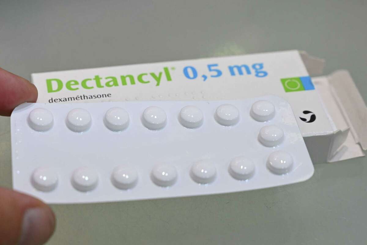 A picture taken on June 16, 2020 in Paris shows tablets of Dectancyl, a drug manufactured by Sanofi containing dexamethasone. The steroid dexamethasone has been found to save the lives of one third of the most serious COVID-19 cases, according to trial results hailed on June 16, 2020 as a "major breakthrough" in the fight against the disease.