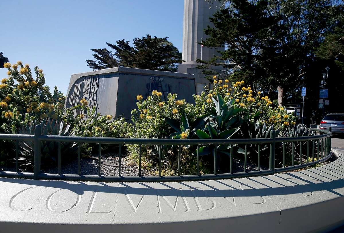 A pedestal is all that remains in the parking lot for Coit Tower in San Francisco, Calif. on Thursday, June 18, 2020 after a crew from the city dismantled a statue of Christopher Columbus during the night.