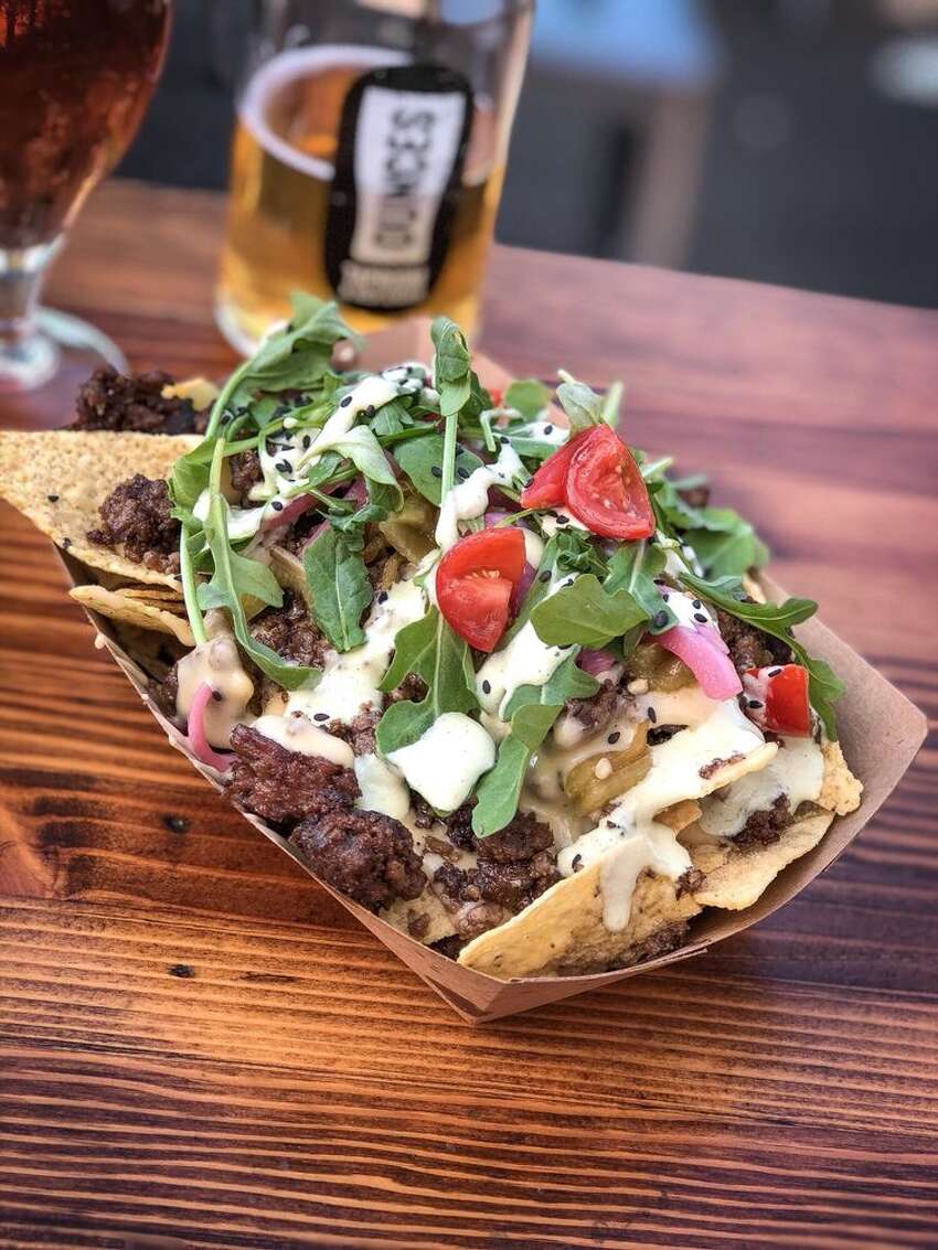 For a hefty stack of nachos... Serving gourmet nachos at some of Seattle's most beloved breweries, Nacho Mama's does not disappoint when it comes to all manner of street corn nachos showered in cotija cheese, and aloha pork belly nachos smothered in marinated pork belly, fontina cheese sauce, fresh pineapple, and pickled red onions.