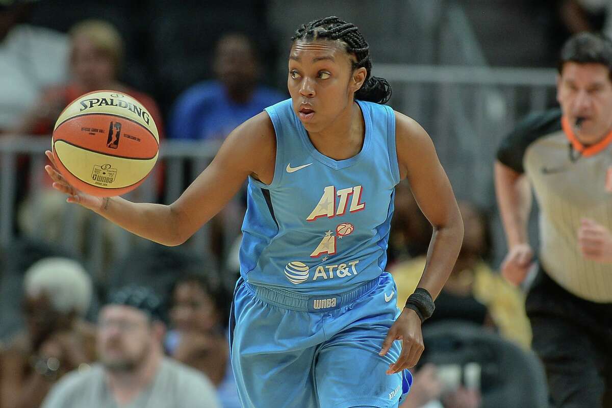 Atlanta’s Renee Montgomery brings the ball up the court during the WNBA game between the Las Vegas Aces and the Atlanta Dream on Sept. 5, 2019 at State Farm Arena in Atlanta. Montgomery, a former UConn standout, announced on Tuesday that she is retiring after 11 WNBA seasons to focus on social justice issues.