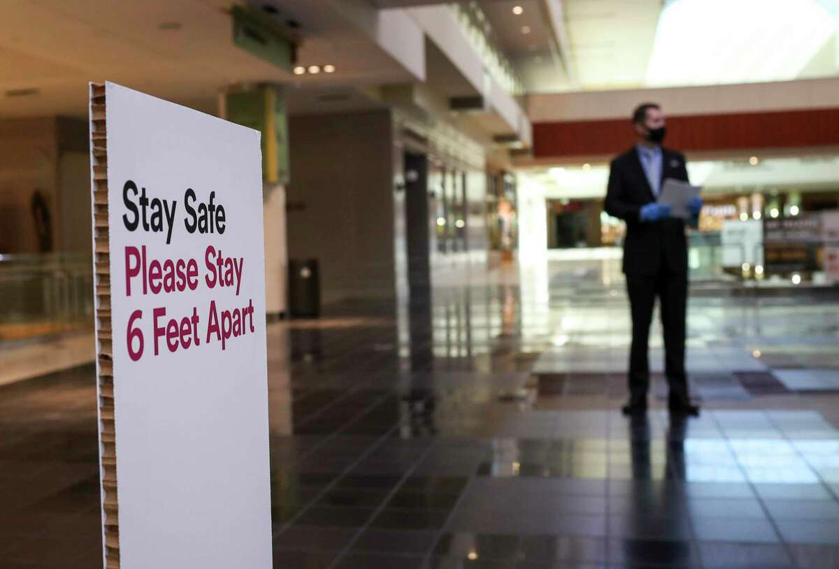 Kurt Webb, mall manager of the Galleria, shown near social distancing guidelines at the mall before it reopens Friday, May 1, 2020, in Houston. The Galleria is one of three malls owned by Simon Property in Houston.