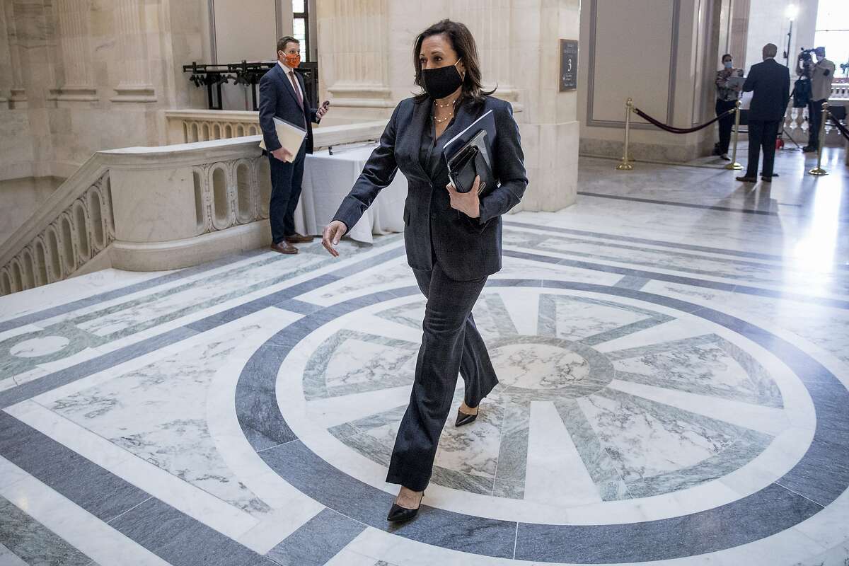 Sen. Kamala Harris, D-Calif., arrives as the Senate Homeland Security and Governmental Affairs committee meets on Capitol Hill in Washington, Wednesday, May 20, 2020, to issue a subpoena to Blue Star Strategies. (AP Photo/Andrew Harnik)