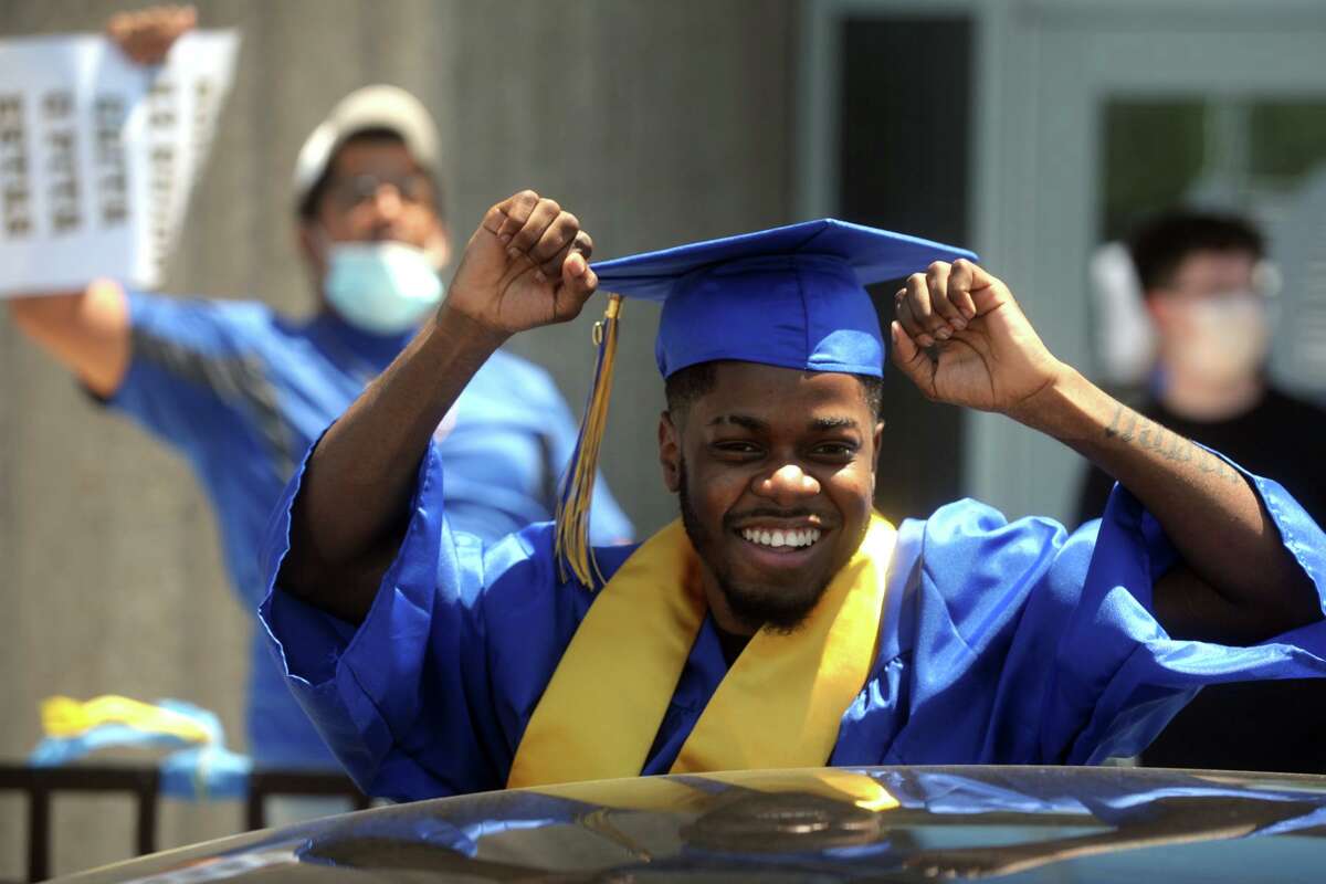 Photos In blue and yellow, Harding High graduates receive diplomas in