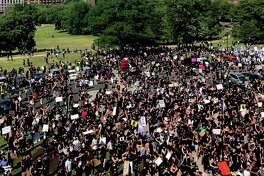 A crowd estimated at 3,000 surged toward the state Capitol on Friday, June 19, 2020 to rally for Juneteenth before marching through the streets of Hartford.