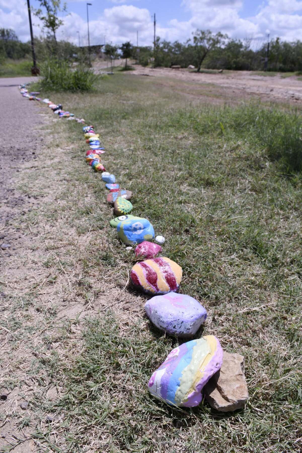 Visitors to North Central Park and other parks throughout Laredo have noticed the COVID-19 Snake, a collection of hand painted rocks lined up as a snake where participants can express their thoughts and show off their artistic talent. The project was started on June 3, 2020 by Once Upon A Rockk, a group for rock lovers.People are asked to hand paint their own rock and add it to the snake in their park.