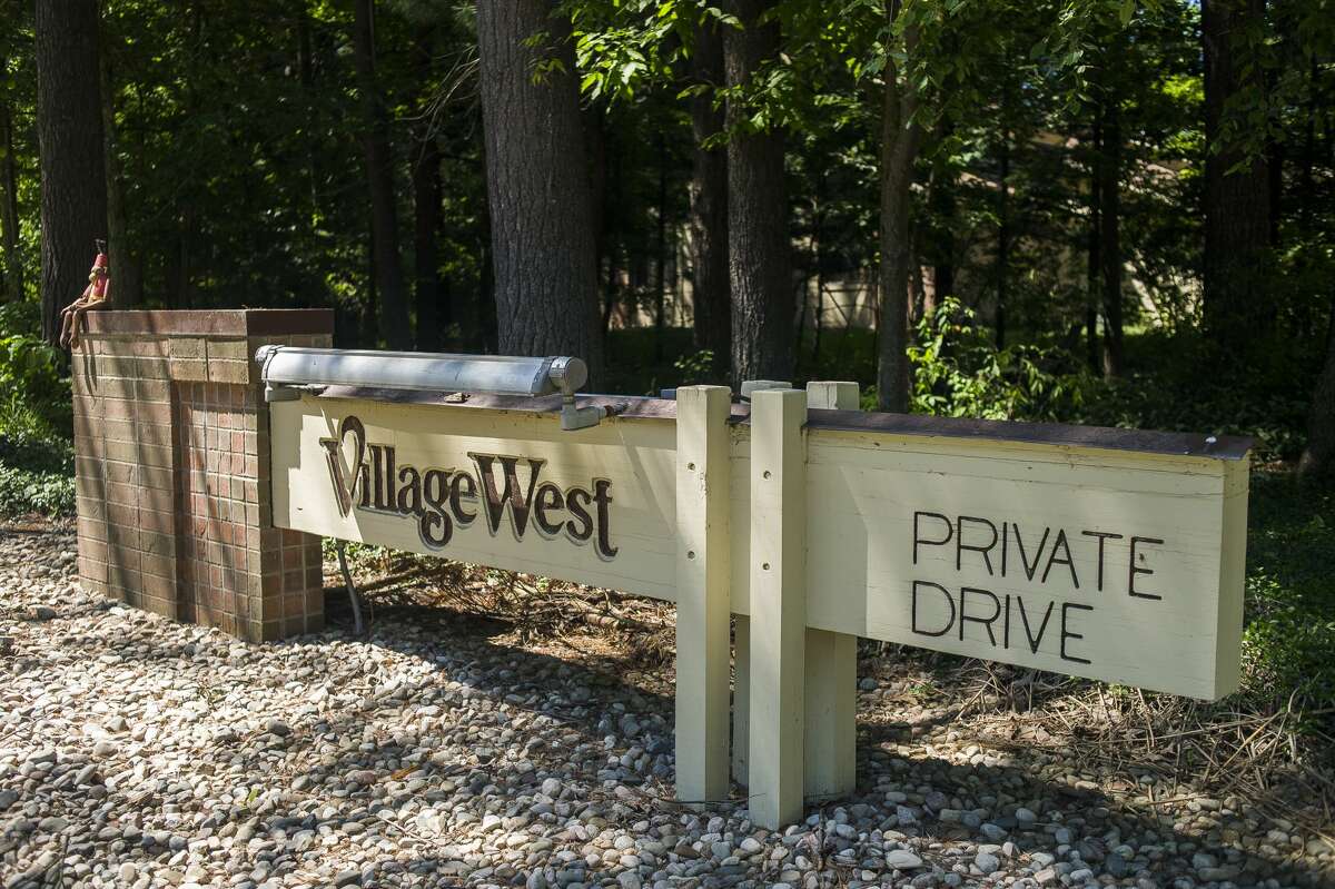 Village West Condominiums were impacted by last month's flood, and homeowners have differing opinions about the path forward. (Katy Kildee/kkildee@mdn.net)