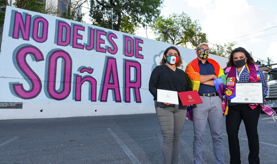 DACA recipients Blanca Margarita Molina, Jose Luis Saldana Cortes and Emilia Janeth Almanza Quistian gather for a photo Saturday, Jun 20, 2020, at a mural in downtown Laredo. Photo: Danny Zaragoza/Laredo Morning Times