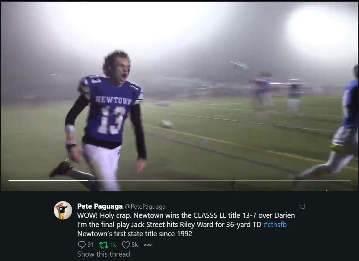Video image captures scene following Riley Ward's game-winning touchdown catch gave Newtown its first state title since 1992 on the anniversary of Sandy Hook.