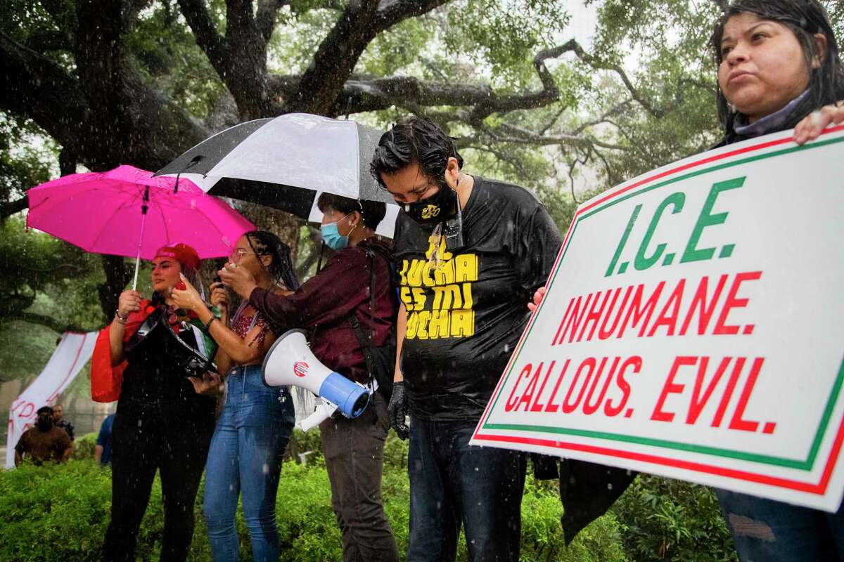 FIEL Houston executive director Cesar Espinosa, center, leads a peaceful protest with the Council on American-Islamic Relations (CAIR-Houston) on Saturday, June 20, 2020, in Houston in support of the immigrants detained by ICE.