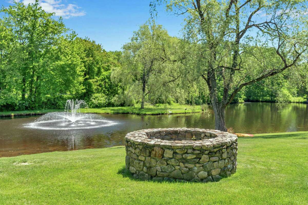 The pond on the front of the property has an aerated water/fountain feature. Also quite close by is the Easton Racquet Club and a handful of local farms, all on Sport Hill Road, including Silverman’s Farm, Sport Hill Farm, Sherwood Farm, and Snow’s Farm. The first three sell fresh produce and other consumables, while the latter carries gardening needs and firewood. The Village Market is also only 1.4 miles away.