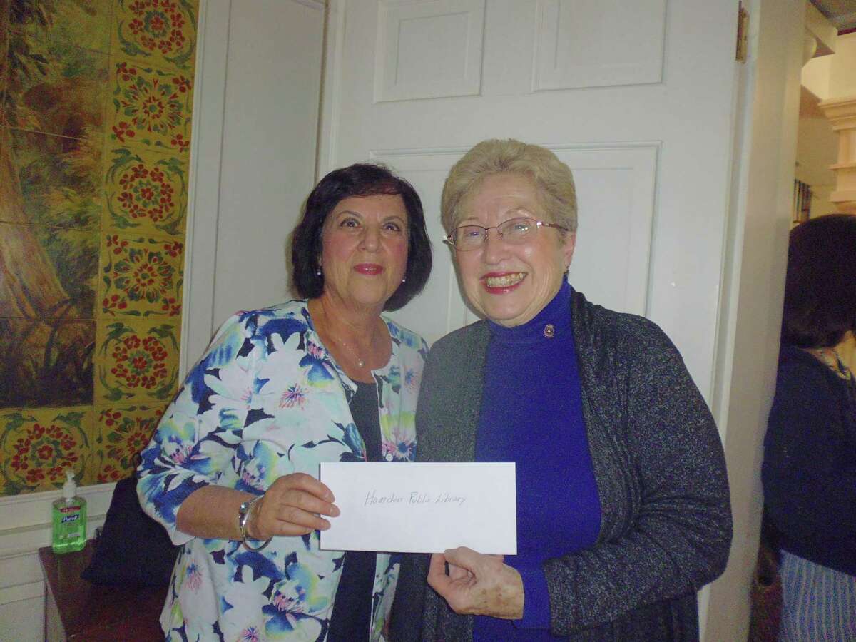 The Hamden Rotary Club's Community Service Committee donated $1,500 to the Hamden Public Library. The funds were used to purchase books, guides, kits, and supplies to enable the library to assist local families with homeschooling needs.  Rotarian Lynn Campo, right, presented the check to recently retired library director Marian Amodeo.