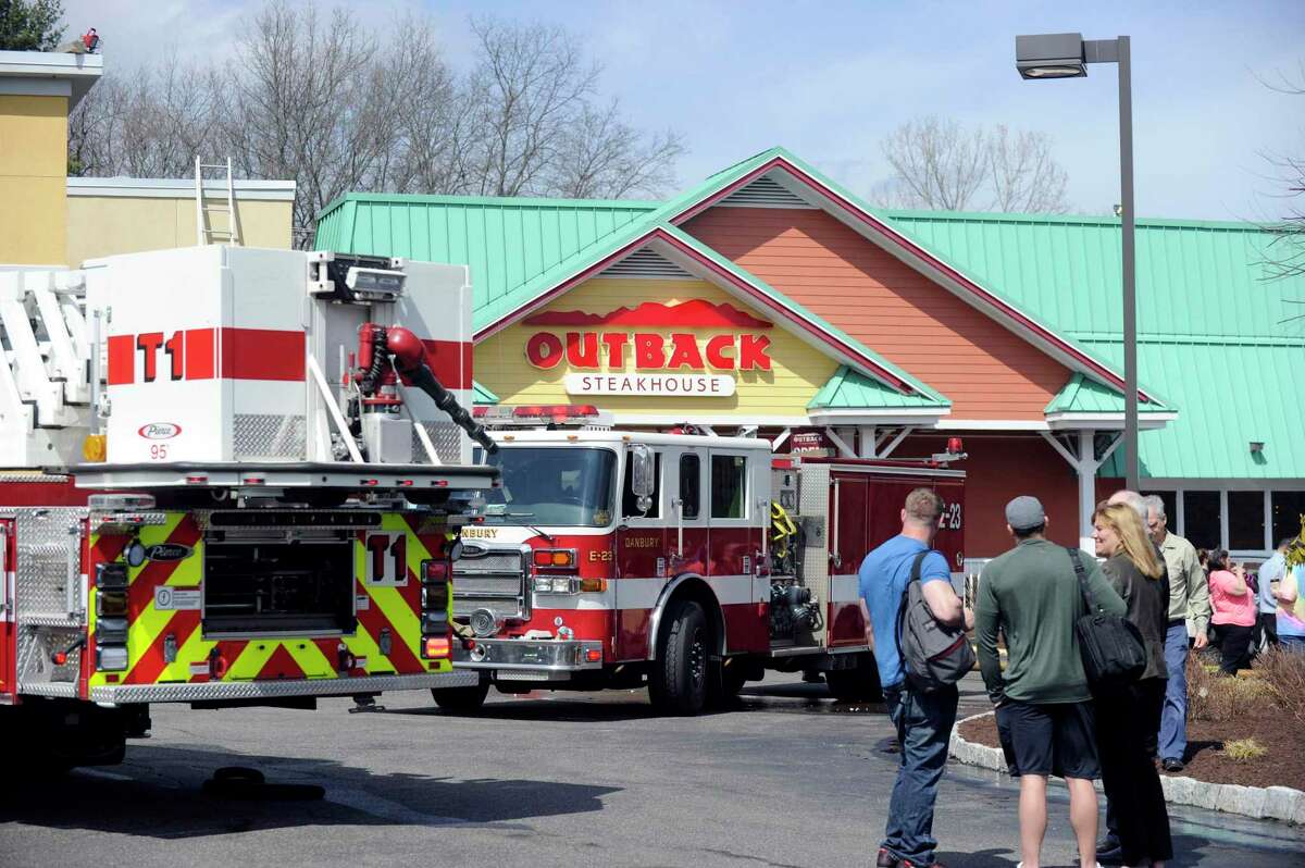 Danbury firefighters respond in 2016 to a call at La Quinta Inn & Suites, with the adjacent Outback Steakhouse pictured. Outback has closed the location permanently as of June 2020, as reported by I-95 Rock, with the chain having seven other restaurants in Connecticut.