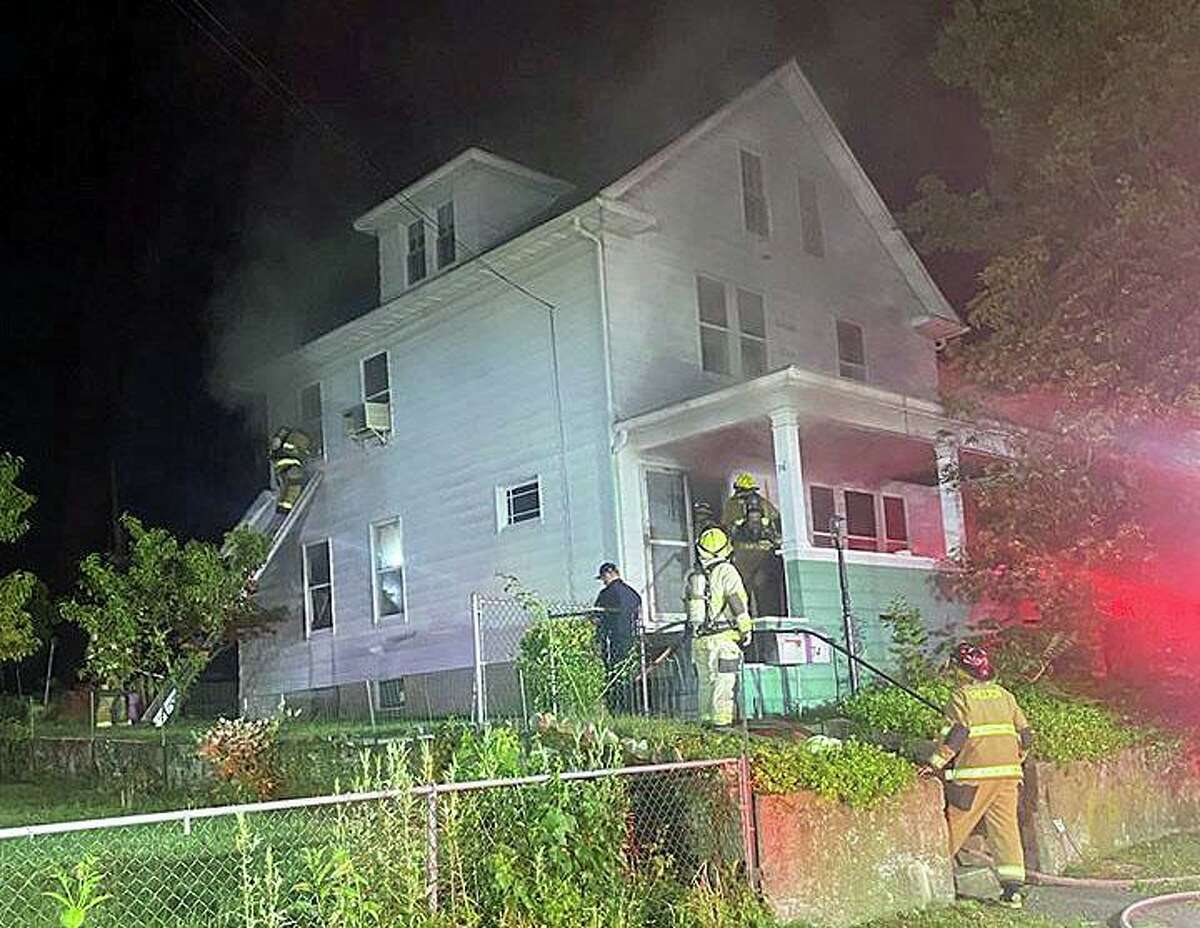 Five people - including three police officers - were hospitalized early Wednesday after a fire at a Hill Street home on June 24, 2020.