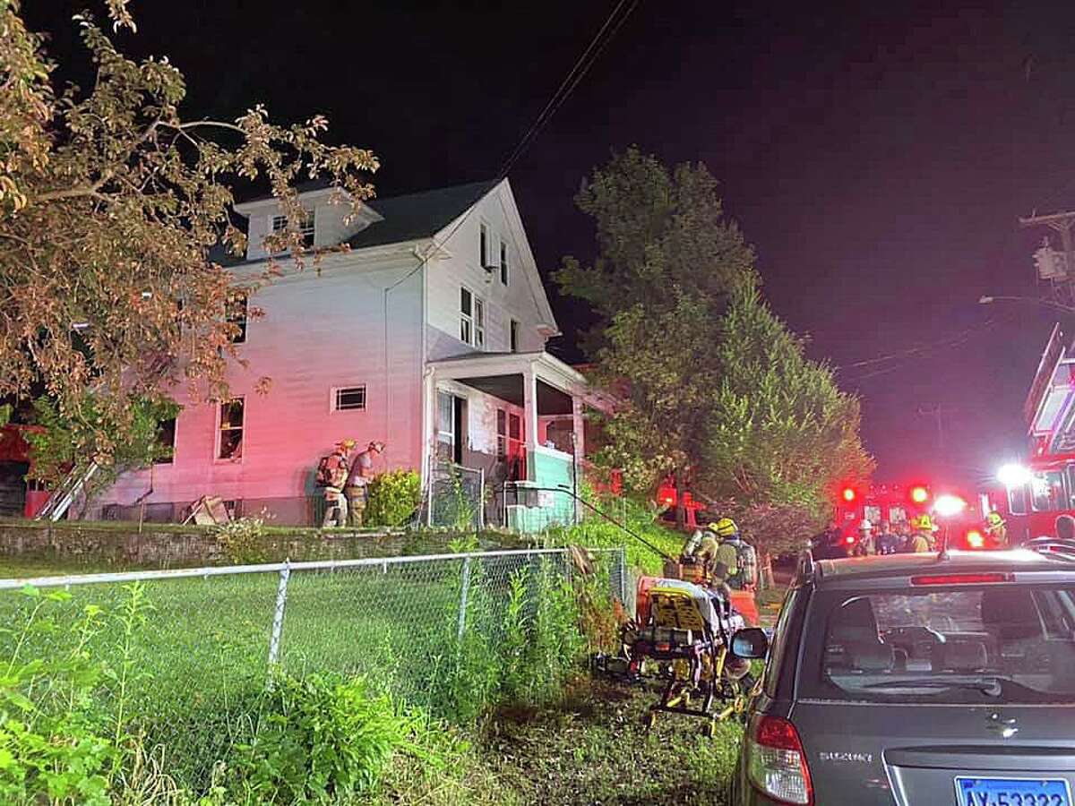 Five people - including three police officers - were hospitalized early Wednesday after a fire at a Hill Street home on June 24, 2020.