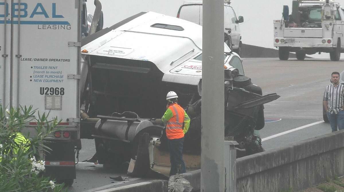 Houston police investigate an 18-wheeler crash along the North Freeway near Crosstimbers on Wednesday, June 24, 2020.