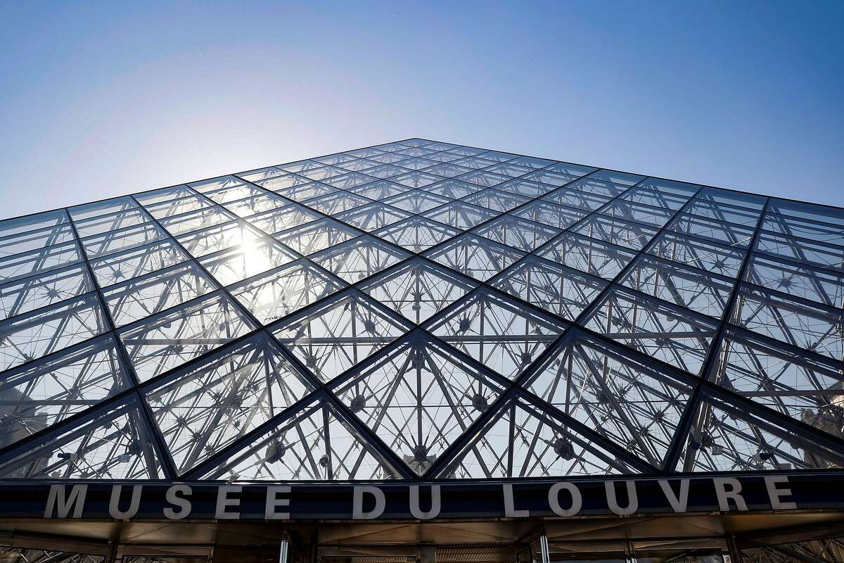 A picture taken on June 23, 2020 shows the Louvre pyramid by Chinese architect Ieoh Ming Pei, the entrance to the Louvre Museum in Paris.  (Photo by THOMAS SAMSON/AFP via Getty Images)