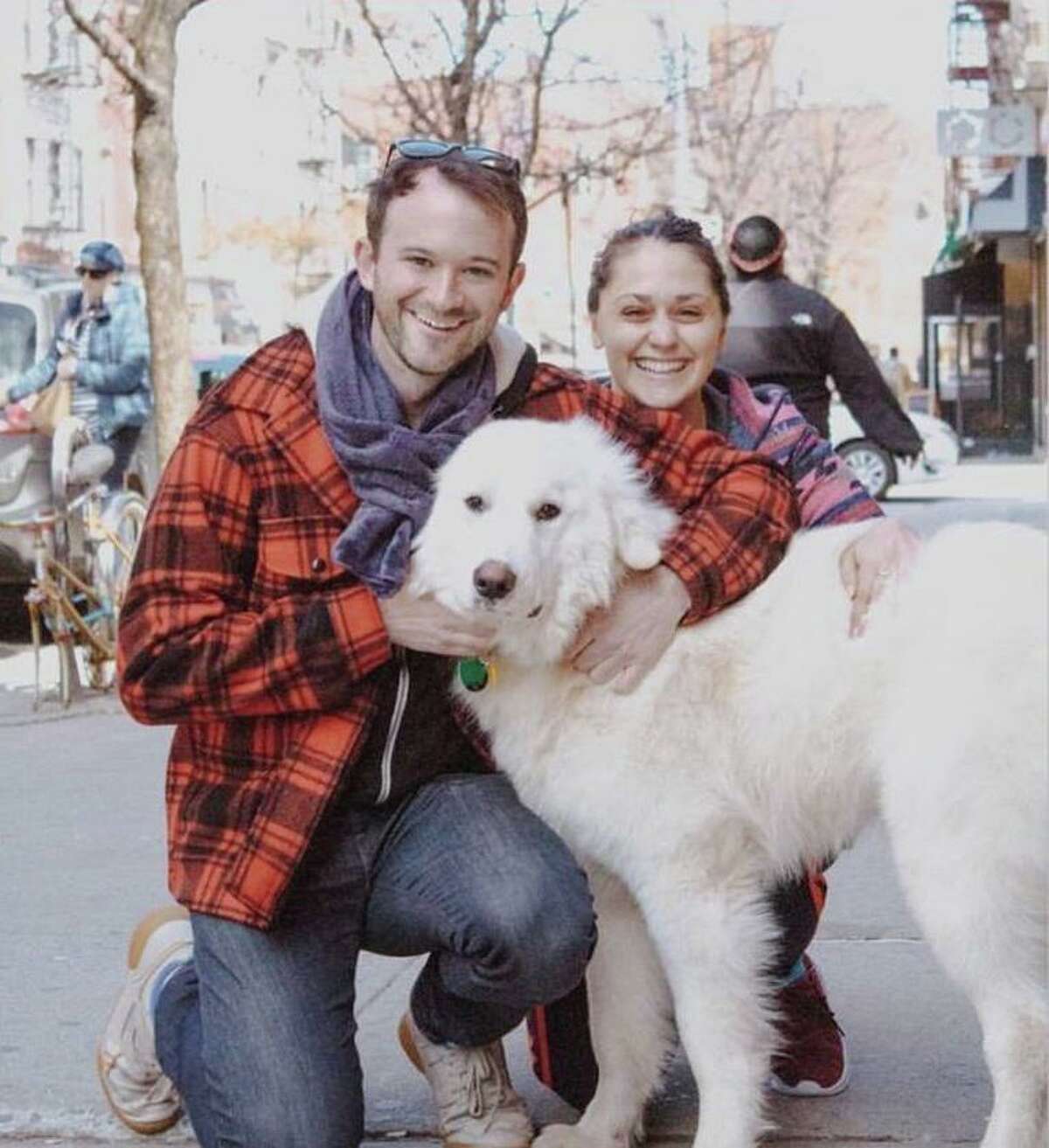 Luther James “Luke” Smith and Lily Rebecca Robinson with their dog, Winston.