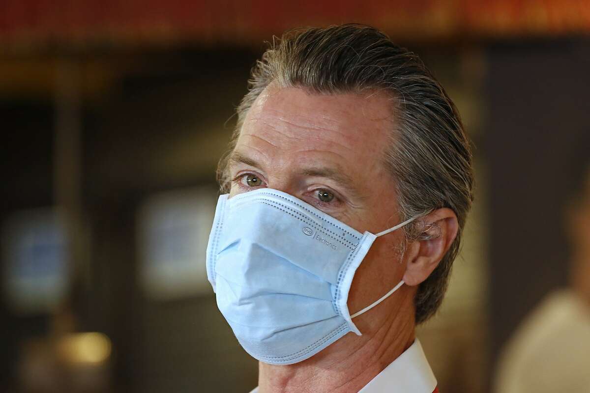 Gov. Gavin Newsom implored people to wear face coverings to protect against the coronavirus and allow businesses to safely open after several days in which the state saw its highest virus hospitalizations and number of infections to date. (AP Photo/Rich Pedroncelli, Pool)